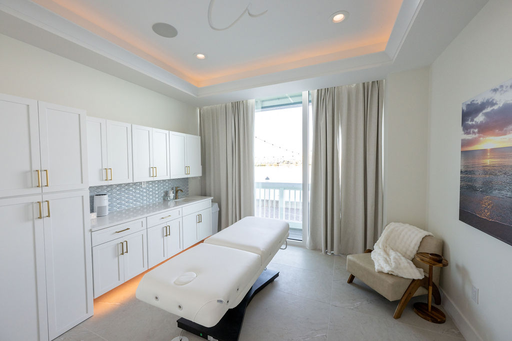 Private waterfront massage treatment room at ästhetik spa and skincare in Fishermen’s Village, Punta Gorda, Florida